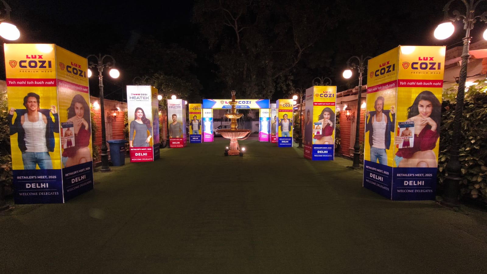 Lux Cozi Retailers Meet Delhi welcome gate with illuminated branded pillars